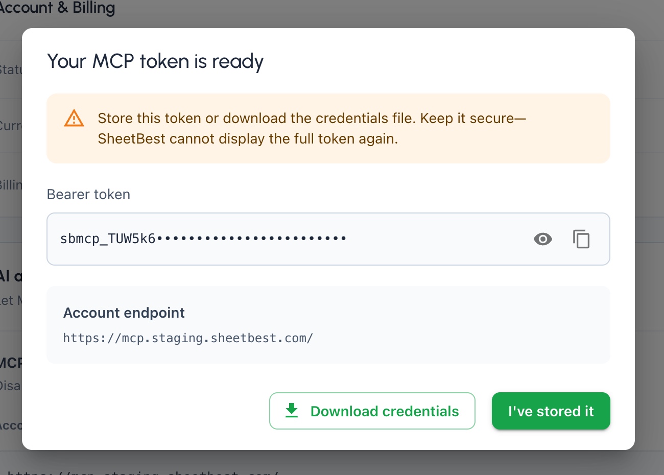 One-time MCP token dialog with the token masked and Download credentials available.