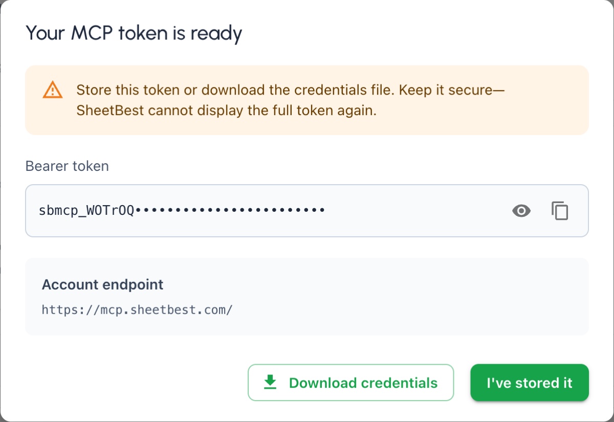 One-time MCP token dialog with the token masked and Download credentials available.